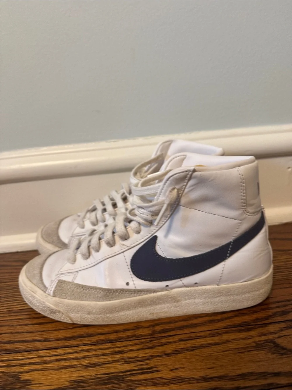 Women’s White High-Top Nike Sneakers